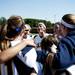 Saline girls huddle and chant before the game against Monroe on Monday, June 3. Daniel Brenner I AnnArbor.com